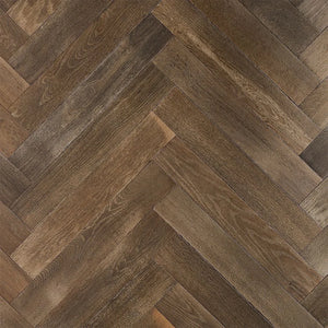 Herringbone Route 4 Left | Color: Medium Grey | Material: French Oak  | Finish: Tumbled | Sold By: Case | Square Foot Per Case: 9.23 | Wood Size: 4.5 x 26 x 0.625 | Commercial: Yes | Residential: Yes | Floor Rated: Yes | Wet Areas: No
